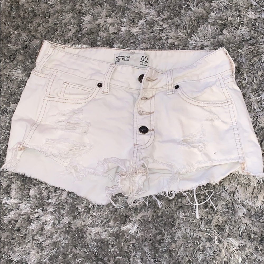 Ripped, white jean shorts